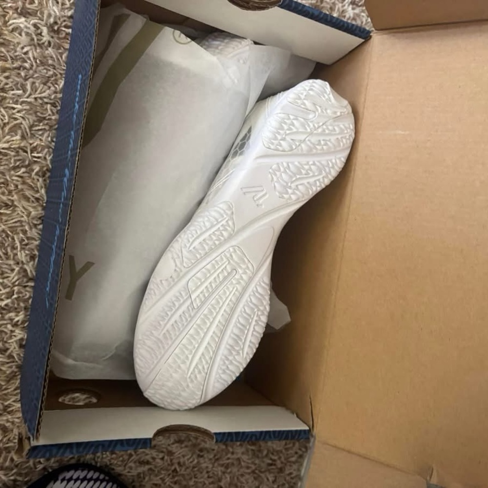 Varsity cheer shoes, never worn size 6 1/2 white!
